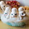 Two Vintage Japanese Ceramic Poodle Puppies in Blue Fur-lined Basket